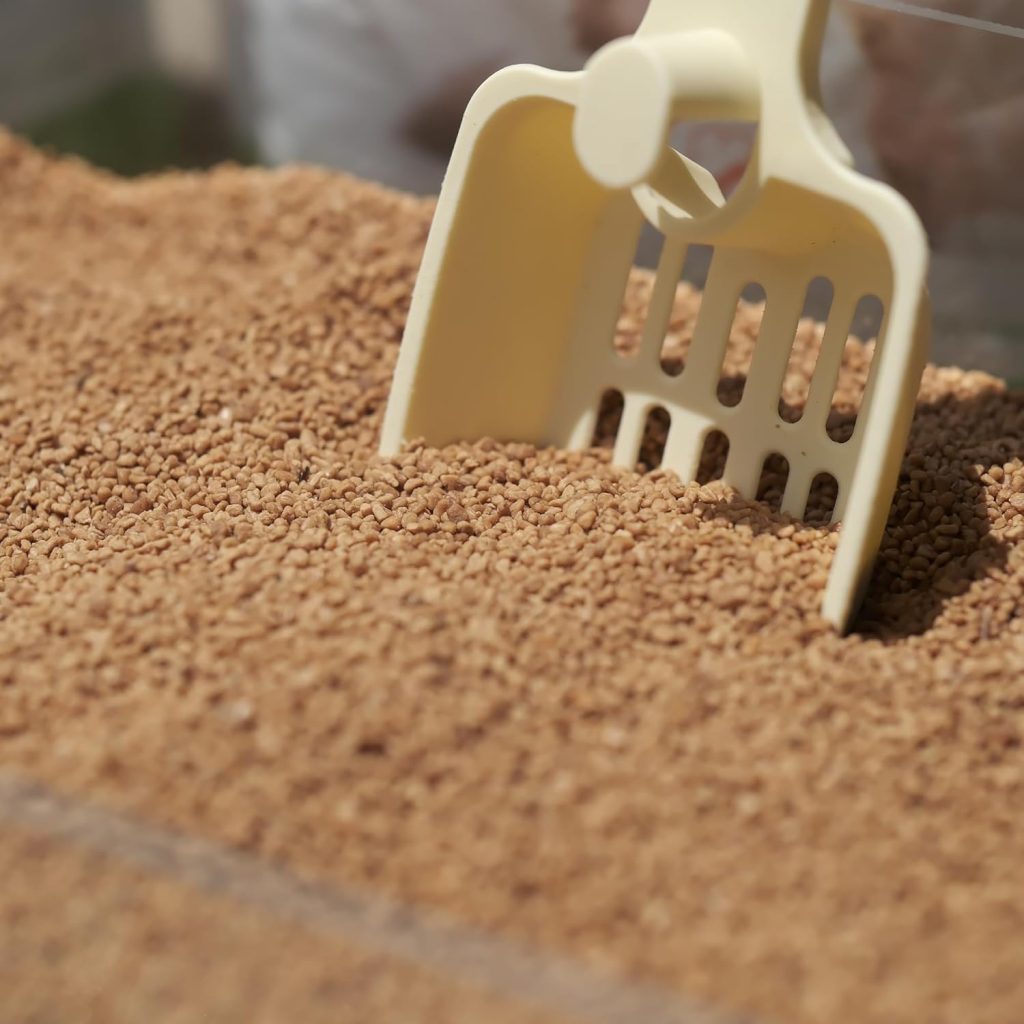 Dust free olive pits cat litter by OliveScoop